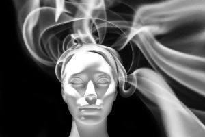 woman's head smoke spirals