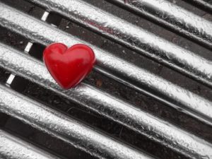 Heart on metal grating