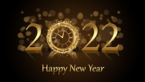 Gold letters saying 2022 Happy New Year. 0 is a clock.