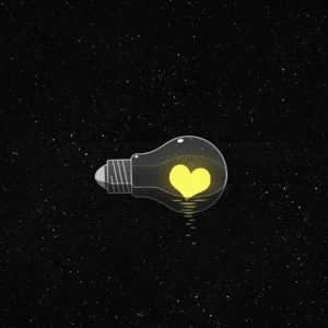 Black background with white stars. White outline of a light bulb with a yellow heart inside.