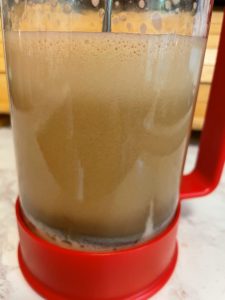 Foamy emulsion in a red French press