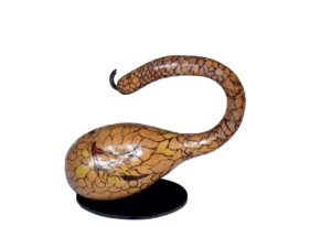 A brown painted gourd in the shape of a waterfowl bending its long neck backwards