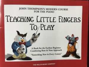 Cover of booklet reading Teaching Little Fingers to Play, A Book for the Earliest Beginner, by John Thompson